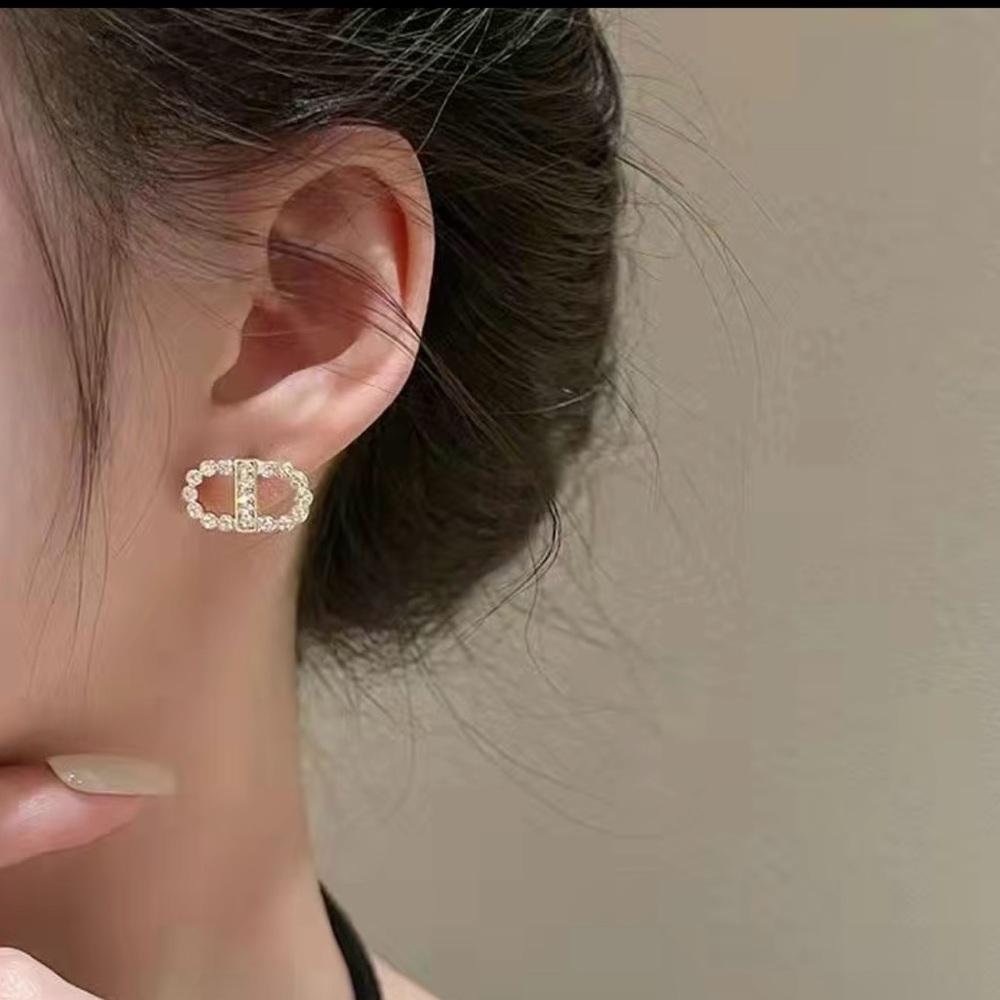 NWT Fashion earrings in gold with silver sparkles